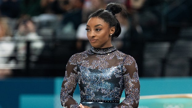 Simone Biles falls behind after Pak salto on uneven bars