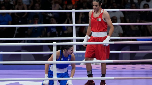 Boxer in gender eligibility controversy wins first Olympics bout