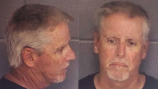 Authorities release mugshot of father of alleged teen shooter