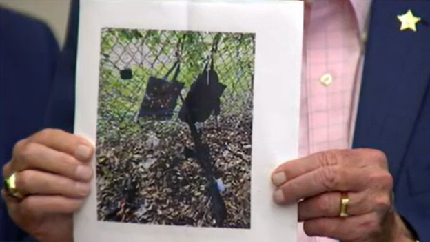 Sheriff’s deputies show photo of backpacks, AK-47 along fence of Trump golf course