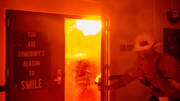 Harrowing photo shows fire ripping through Altadena school auditorium amid California wildfires