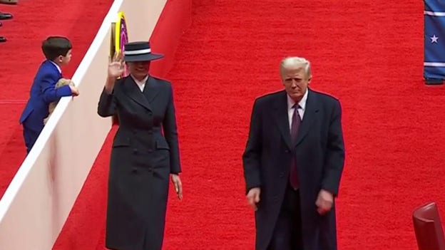 President Donald Trump arrives for indoor Inaugural Parade