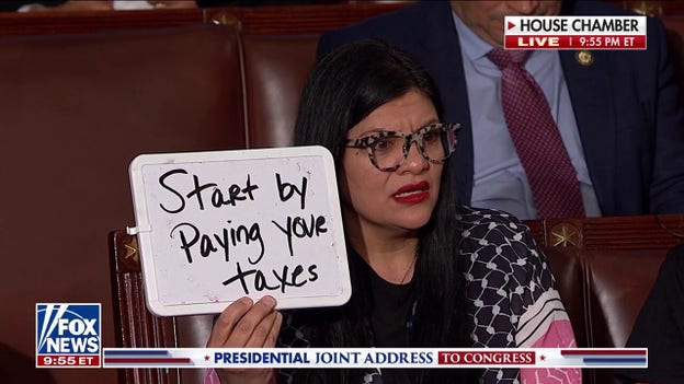 'Start by paying your taxes': Rep. Tlaib goes viral for whiteboard