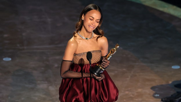 Zoe Saldana in tears as she wins best supporting actress for 'Emilia Pérez'