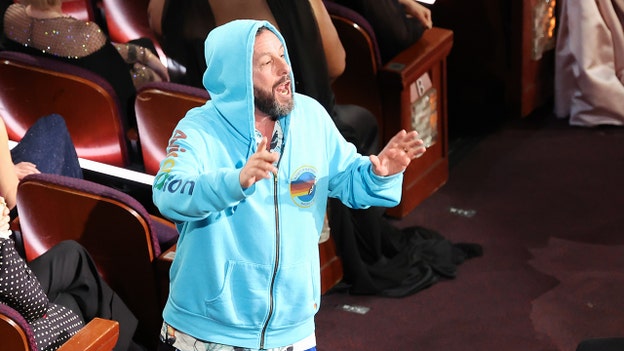 Conan O'Brien slams Adam Sandler's attire during Oscars