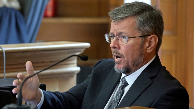 Defense questions Dr. Judson Welcher on PowerPoint edits, contact with prosecutors before testimony