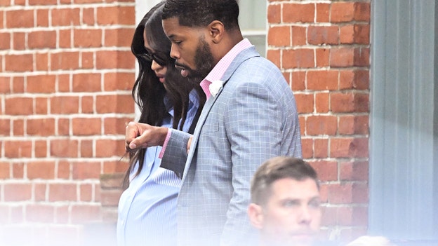 Very pregnant Cassie seen before arriving to court for cross-examination