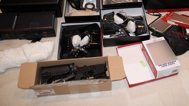 Jury shown gun hidden in shoebox found during raid of Diddy's home