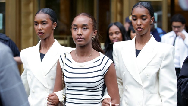 Diddy’s twin daughters graduate high school as rapper stands trial for sex trafficking
