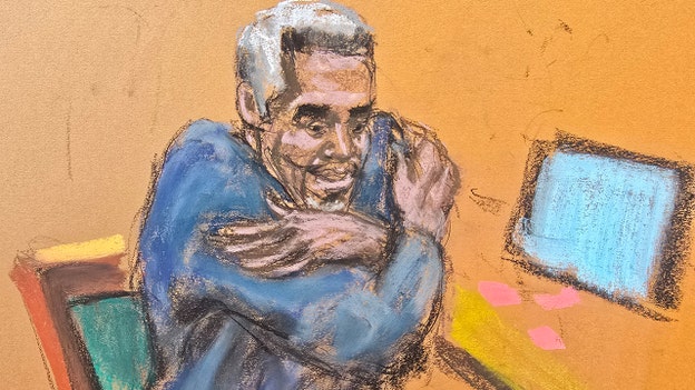 SEE IT: Diddy attempts to stay warm in chilly courtroom