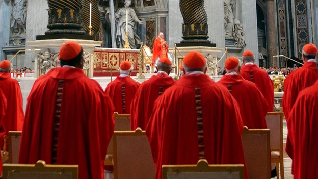 Why are Cardinal voting ballots burned and used for signaling a new pope?