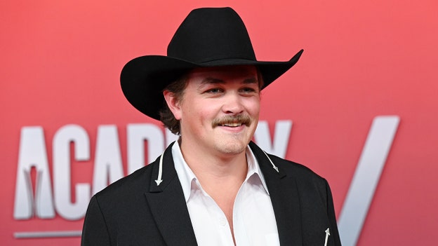 Brooks & Dunn announced to Zach Top he received award for 2025 AMC new male artist of the year