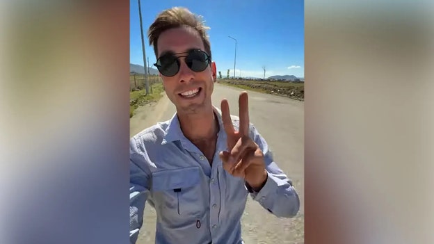 American cyclist's global adventure derailed when 'bombs started falling' in Iran