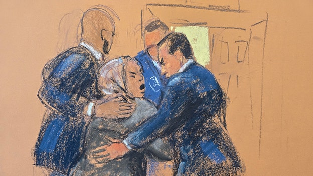 SEE IT: Woman yells out as she's removed from Diddy's courtroom