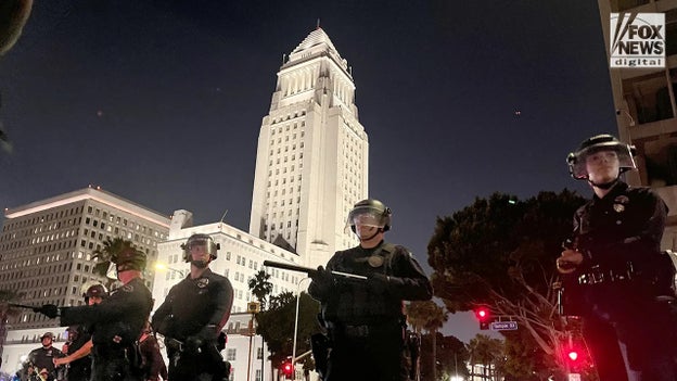 LAPD arrests dozens of protesters as authorities restore order following 'unlawful assembly'