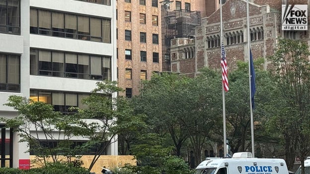 Flags lowered at Park Avenue tower where 4 people were killed