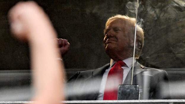 Crowd chants ‘USA’ as President Trump arrives at Charlie Kirk memorial in Arizona