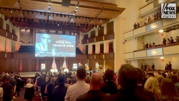 Tissues passed row by row as mourners fill Kennedy Center for emotional memorial