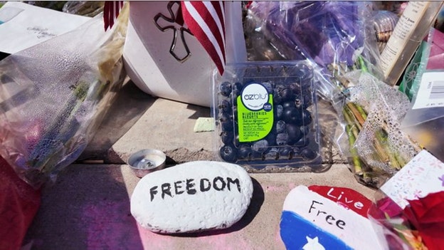 ‘They killed the messenger, but they can’t kill the message:' Kirk mourners gather outside TPUSA HQ