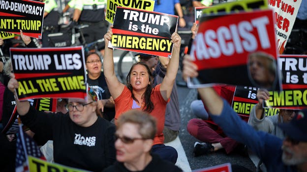 Anti-Trump protests block street outside UN prompting arrests