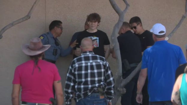 Video shows man vandalizing Charlie Kirk memorial outside Turning Point USA HQ in Phoenix