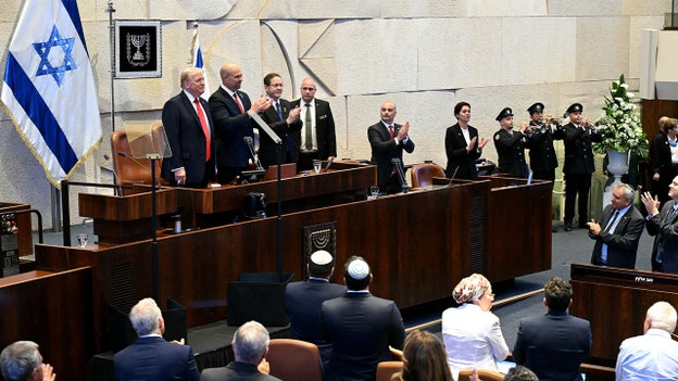 Trump greeted with thunderous applause at Israeli parliament