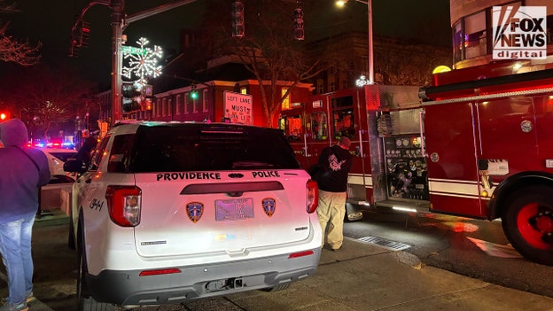 Police recover 2 handguns after person of interest arrested in Brown University shooting