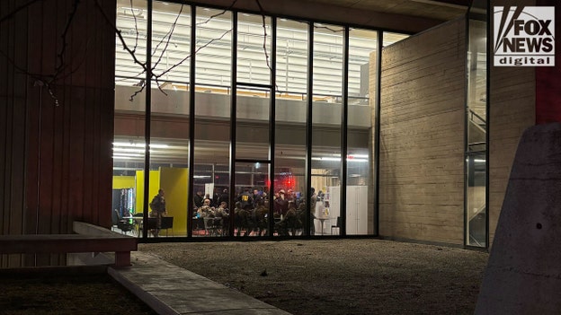 Brown University says its 'imperative' community remains sheltered in place as manhunt continues