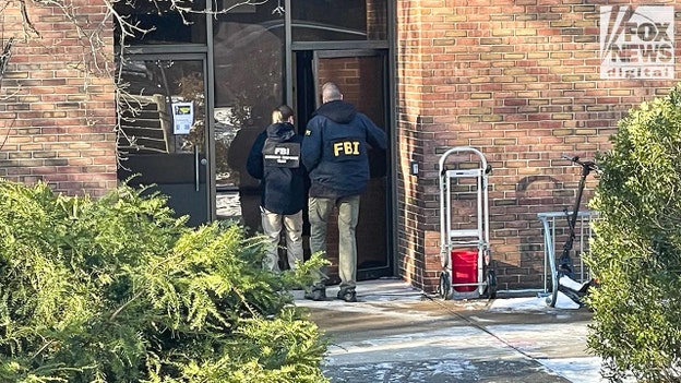 FBI agents seen entering Brown University engineering building where shooting happened