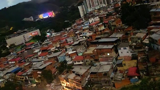 Heavy gunfire reported in Caracas near Venezuela's presidential palace