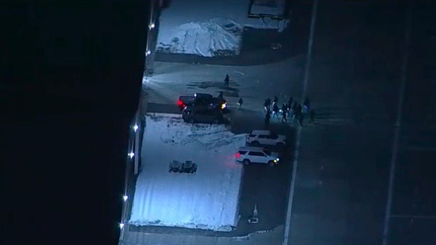 Persons escorted out of plane believed to carry Maduro, wife, under cover of darkness