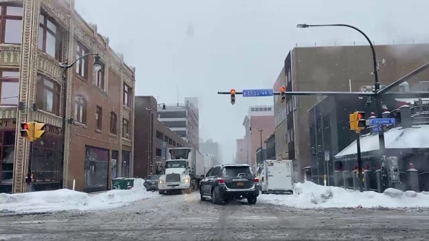 VIDEO: Roads remain slick as snow continues to fall in Buffalo, New York