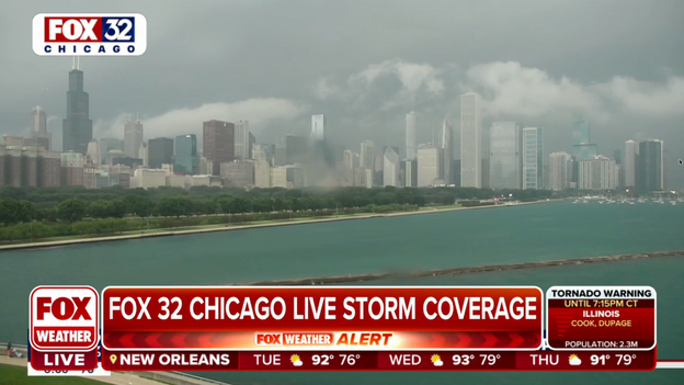 Clouds hover in the Chicago skyline as tornado-warned storm approaches