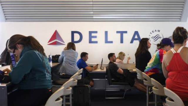 Delta jet skids off runway at LaGuardia Airport