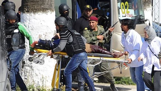 Who is responsible for the terror attack on a Tunisian museum?