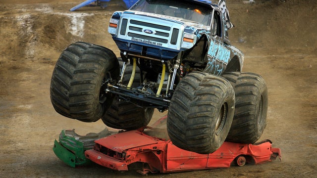 Car-crushing, ear-blowing monster truck makes donuts 