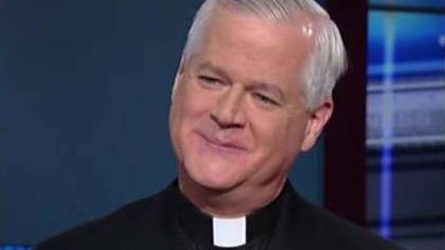 Catholic Priest sounds off on Daily News 'God' cover
