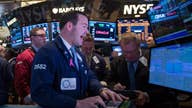 Dow hits record high as Amazon, Apple pull down S&P 500