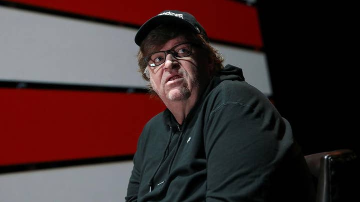Michael Moore attends Russia-sponsored anti-Trump rally