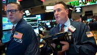 Dow claws back after posting triple-digit losses