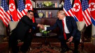 Trump, Kim Jong Un sign document of progress
