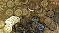 Bitcoin plunges below $6,000 amid security, regulatory concerns