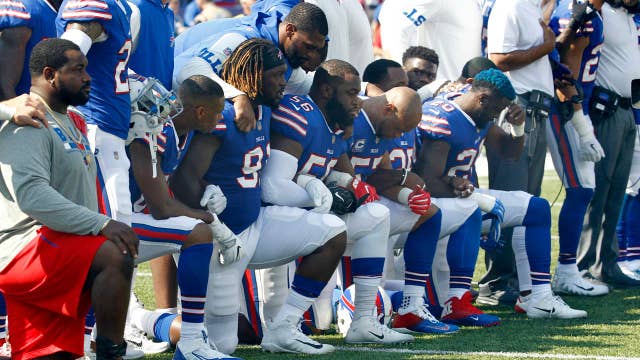 NFL puts new kneeling policy on hold