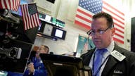 Stocks edge lower as investors await Fed decision