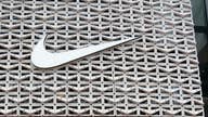 Nike surges on earnings beat after tough market day