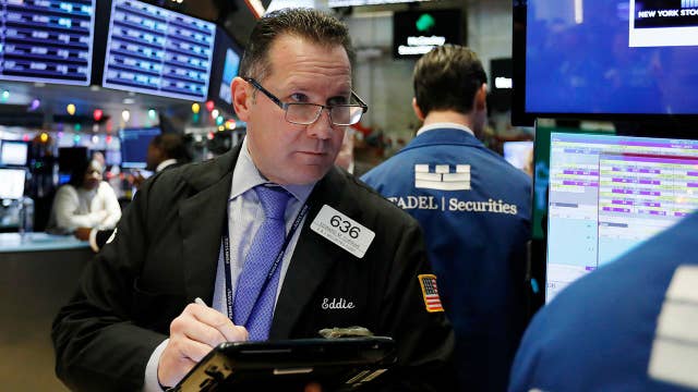 US stocks climb after Fed leaves rates unchanged