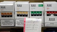 Juul suspends popular vaping flavors