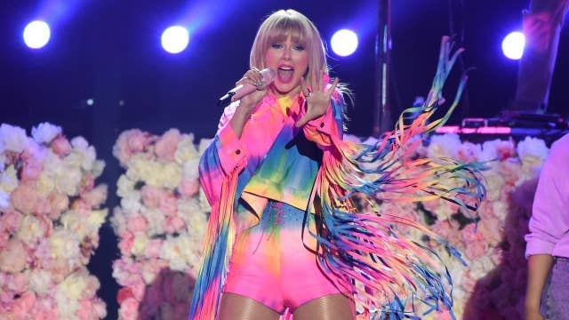 Is Taylor Swift ruffling feathers over her decision to perform in Shanghai?