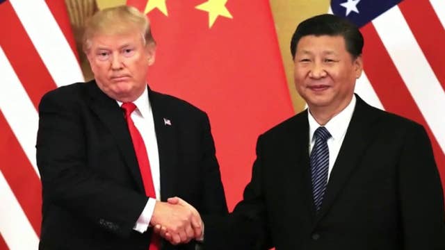 John Bolton: Trump varies his China position 'day by day'