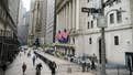Dow hits record close due to optimism over COVID relief negotiations